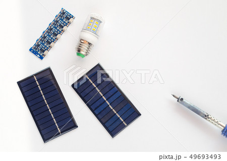 Mini solar panel and tool on background . 49693493