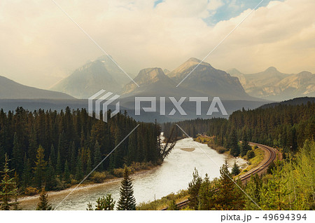 Mountain river and railway 49694394