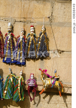 Colorful Puppets displayed on the wall, Jaisalmer 49698449