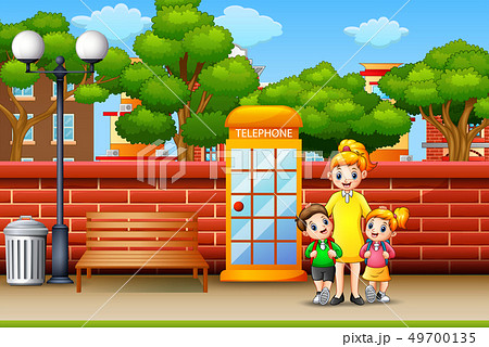 Happy family standing on sidewalk 49700135