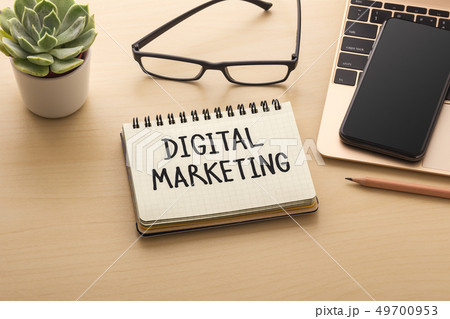 Digital marketing with laptop and smart phone Digital marketing with laptop and smart phone 49700953