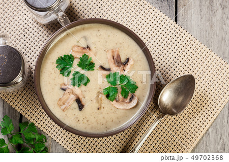 Mushroom cream soup with herbs and spices Mushroom cream soup with herbs and spices 49702368