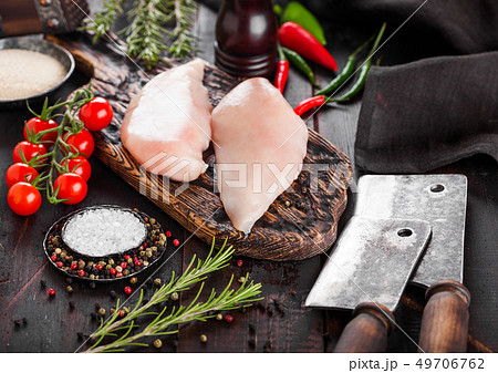 Fresh Raw Organic Chicken Fillet Breast on vintage Fresh Raw Organic Chicken Fillet Breast on vintage 49706762