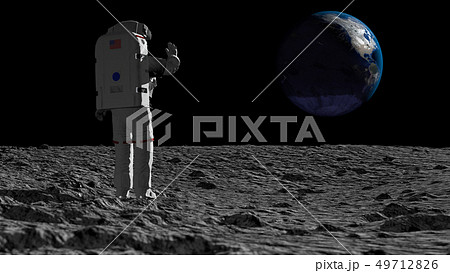 Astronaut walking on the moon and admiring the Astronaut walking on the moon and admiring the 49712826