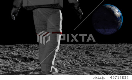 Astronaut walking on the moon and admiring the 49712832