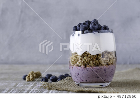 Granola with yogurt and blueberries 49712960