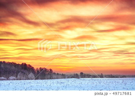 winter landscape with sunrise 49717681