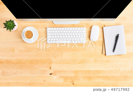 Top view of large desktop computer on wooden table 49717992