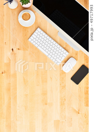 Modern workspace with large desktop computer 49717993