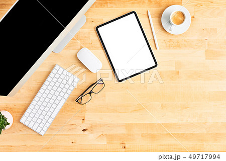 Modern workspace with digital tablet and computer Modern workspace with digital tablet and computer 49717994