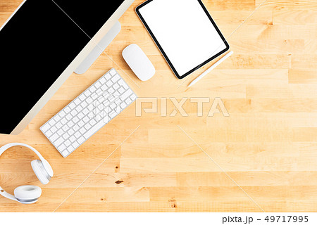 Modern workspace with digital tablet and computer Modern workspace with digital tablet and computer 49717995