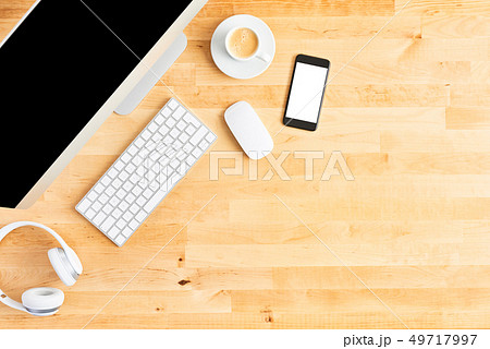 Top view of large desktop computer on wooden table Top view of large desktop computer on wooden table 49717997
