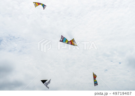 Kites flying in the sky among the clouds.Kite Kites flying in the sky among the clouds.Kite 49719407