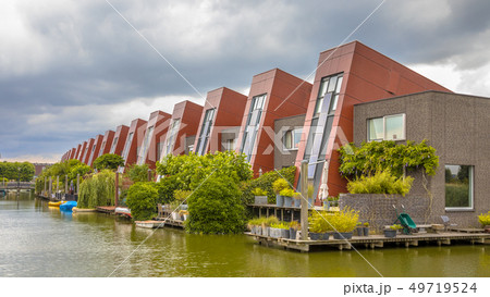 Ecological houses with hanging vertical gardens Ecological houses with hanging vertical gardens 49719524