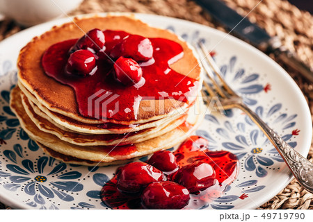 Stack of pancakes with dogwood berry marmalade 49719790
