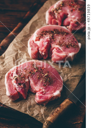 Pork loin steaks with ground spices Pork loin steaks with ground spices 49719839