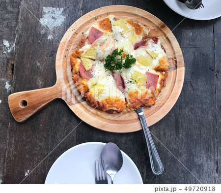 home made pizza on wooden table,delicious and yum 49720918