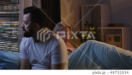 Couple having late night argument 49732034