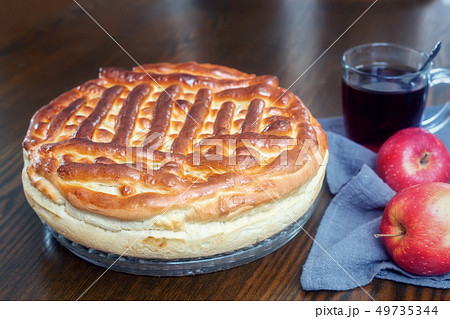 In the greenhouse grows a young cucumber. 49735344