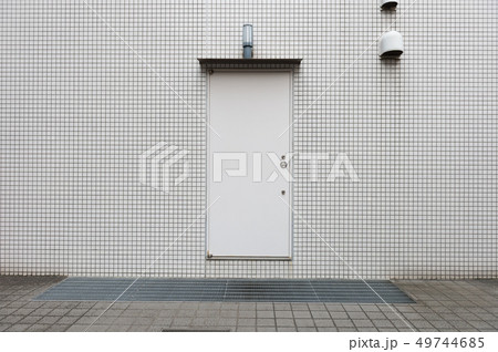 sidewalk by street wall & door 49744685