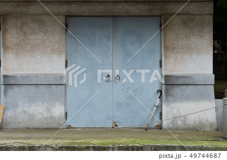 sidewalk by street wall & door 49744687