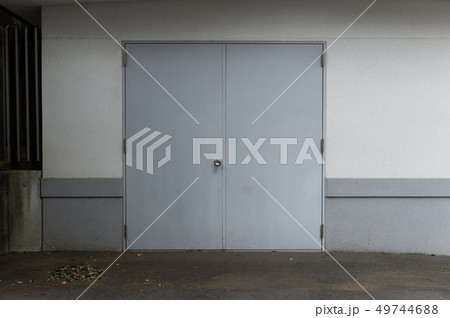 sidewalk by street wall & door 49744688