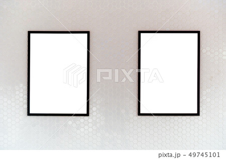 Large blank billboard on a street wall, banners 49745101