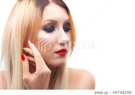 Beautiful woman face studio isolated on the white 49748200