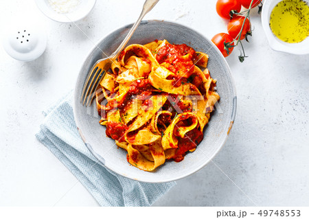 Tasty italian pizza with tomato sauce and parmesan Tasty italian pizza with tomato sauce and parmesan 49748553