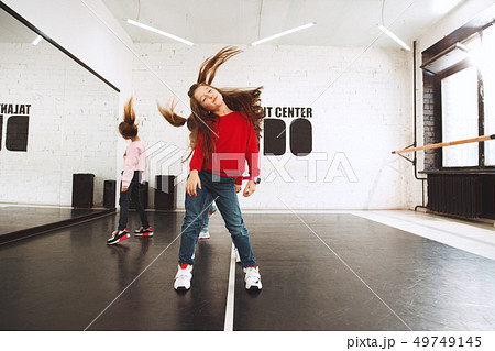 The kids at dance school. Ballet, hiphop, street, funky and modern dancers The kids at dance school. Ballet, hiphop, street, funky and modern dancers 49749145