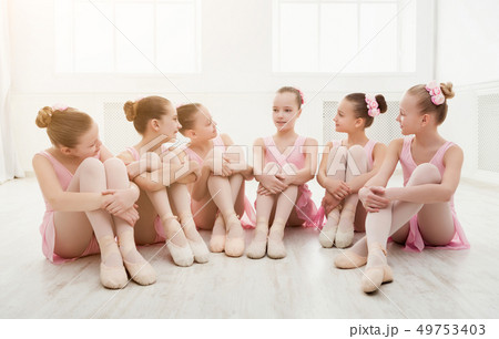 Little girls dancing ballet in studio 49753403
