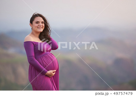 Portrait of smiling hispanic woman 49757479