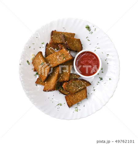 Toast rye bread and tomato sauce on the plate, isolated on white background. Top view Toast rye bread and tomato sauce on the plate, isolated on white background. Top view 49762101