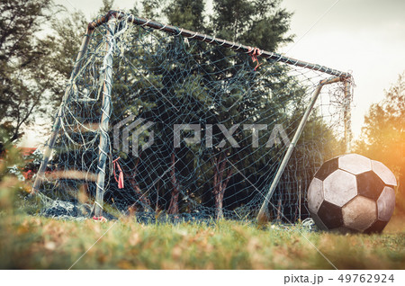 Lonely football gate or soccer goal in neglected 49762924