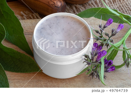 A jar of homemade comfrey root ointment  49764739