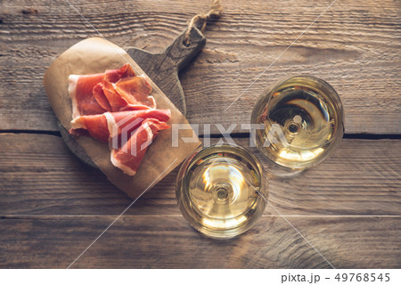 Two glasses of white wine 49768545