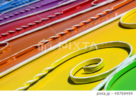 Metal texture of a piece of colored wall with a 49769494