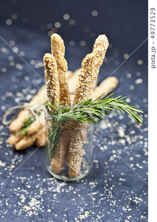 Italian grissini or salted bread sticks with 49773529