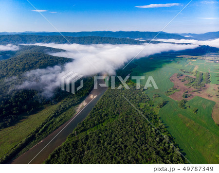 aerial view landscape of mountains with river and clouds 49787349