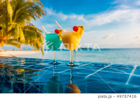 Cocktail near the swimming pool 49787416