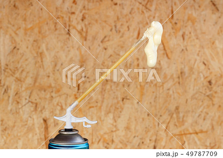 Spray can with foam which is used in construction. Spray can with foam which is used in construction. 49787709