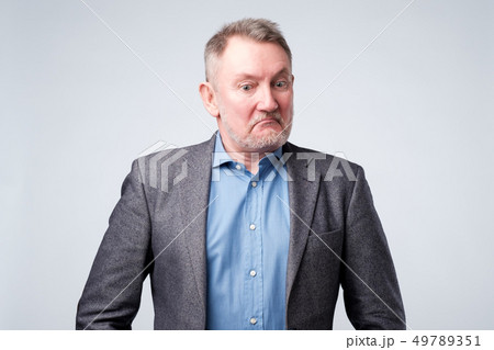 serious middle aged old senior man thinking serious middle aged old senior man thinking 49789351