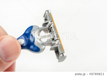 Modern Razor Blade With Three Razors In The Hand 49789821