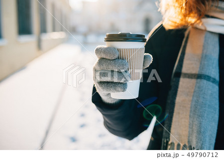 Close-up female's hand in warm glove Close-up female's hand in warm glove 49790712