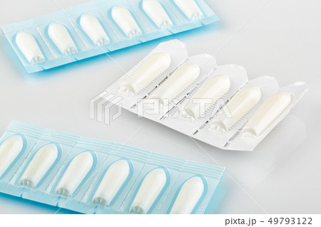 Blue and white packages with suppository 49793122