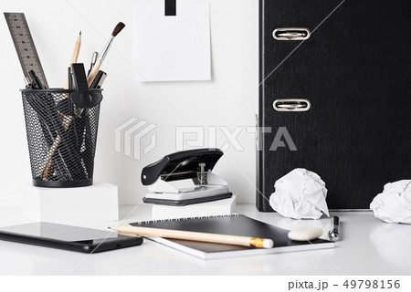 Office supplies on white background Office supplies on white background 49798156