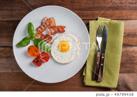Fried egg and bacon Fried egg and bacon 49799438