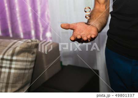 the groom throws the wedding rings in the air 49801337