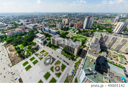 Aerial city view with crossroads and roads, houses buildings. Copter shot. Panoramic image. Aerial city view with crossroads and roads, houses buildings. Copter shot. Panoramic image. 49805142