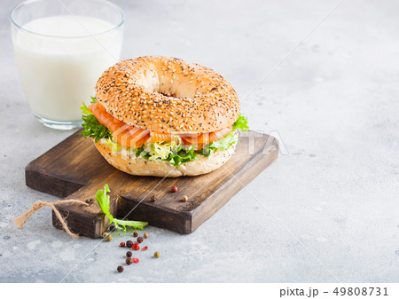 Fresh healthy bagel sandwich with salmon, ricotta 49808731